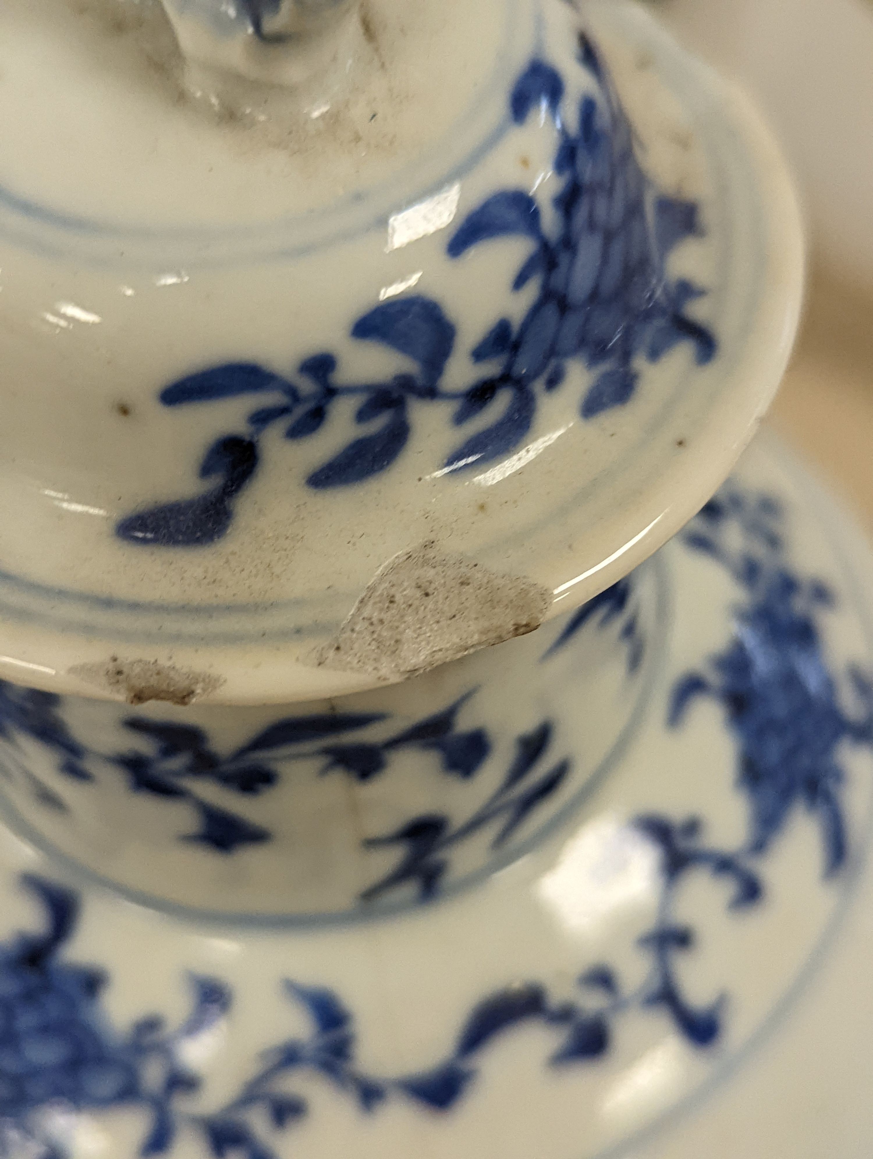 An early 20th century Chinese blue and white lidded vase together with a similar enamelled pottery vase and a Japanese blue and white dish. Tallest vase 29cm